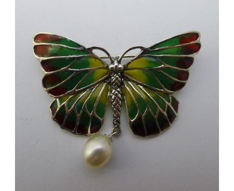 A silver and enamel butterfly brooch
