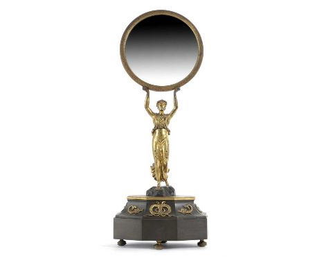 A FRENCH 'EMPIRE' GILT AND PATINATED BRONZE DRESSING TABLE MIRRORC.1830-50with a convex plate within an engine turned frame s