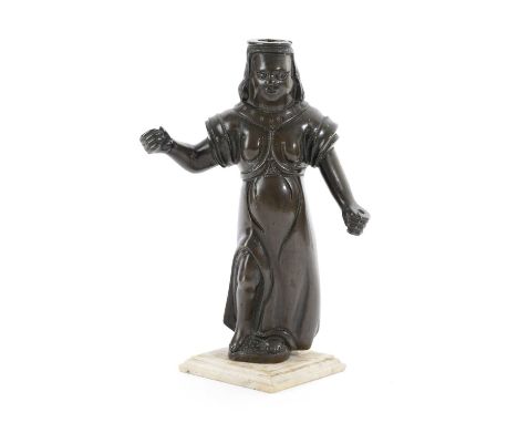 A GERMAN BRONZE FIGURAL CANDLESTICKNUREMBERG, LATE 15TH / EARLY 16TH CENTURYin the form of a lady her dress with punched deco