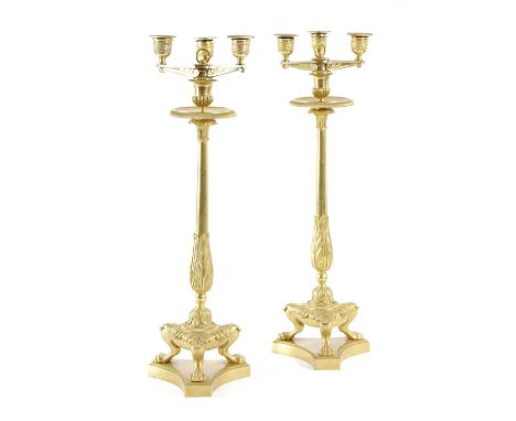 A PAIR OF EMPIRE ORMOLU CANDELABRA IN THE MANNER OF PIERRE PHILIPPE THOMIRE (1751-1843), EARLY 19TH CENTURYeach with a detach