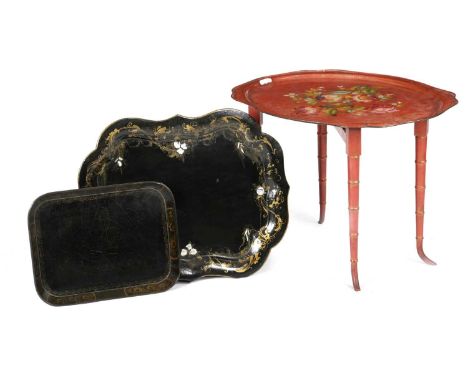 TWO PAPIER-MÂCHÉ TRAY TABLESEARLY 19TH CENTURY AND LATERone by Clay with gilt borders and stamped 'Clay, King St. Covt Garden