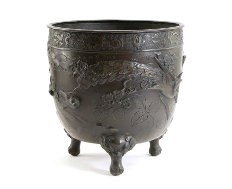 A JAPANESE BRONZE JARDINIÈREMEIJI, LATE 19TH / EARLY 20TH CENTURYthe body relief decorated with birds on mythical beast tripo