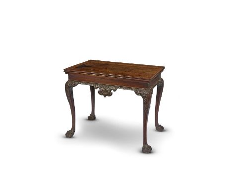 A FINE EARLY GEORGE III MAHOGANY SILVER TABLEC.1760-70the rectangular top with a moulded gallery above a frieze carved with s