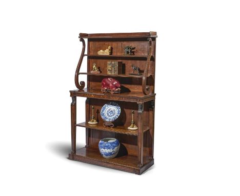 A FINE REGENCY MAHOGANY OPEN BOOKCASE IN THE MANNER OF THOMAS HOPE, EARLY 19TH CENTURYinlaid with ebony Greek key stringing a