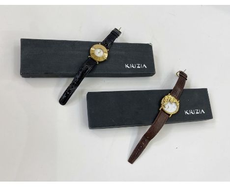 Krizia watch - gold coloured metal with a panther draped to the left hand side, on a brown leather lizard strap, serial numbe