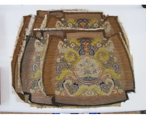 Six antique needlepoint tapestry chair covers with scrolling foliate patterns surrounding a fig tree in yellow, red, blue, gr