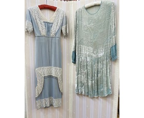 Edwardian pale blue dress with lace detail to the bodice, neckline and sleeves, with bugle bead fringe, the skirt's over pane