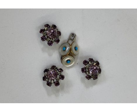 Three gold-backed mother-of-pearl with central turquoise bead dress studs and three paste vintage buttons in mauve and diaman