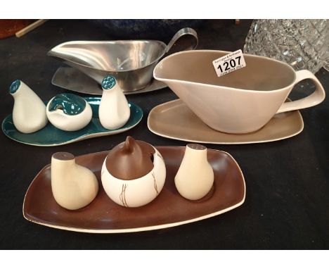 Two Carltonware cruets, a stainless steel gravy boat  Old Hall, and a Poole gravy boat with saucer. Not available for in-hous