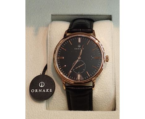 New old stock boxed gents Ornake wristwatch gold tone with black dial. P&amp;P Group 1 (£14+VAT for the first lot and £1+VAT 
