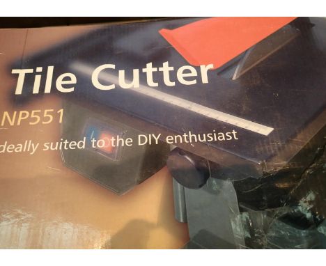 A boxed nut tool NPSS electric tile cutter. Not available for in-house P&amp;P, contact Paul O'Hea at Mailboxes on 01925 6591