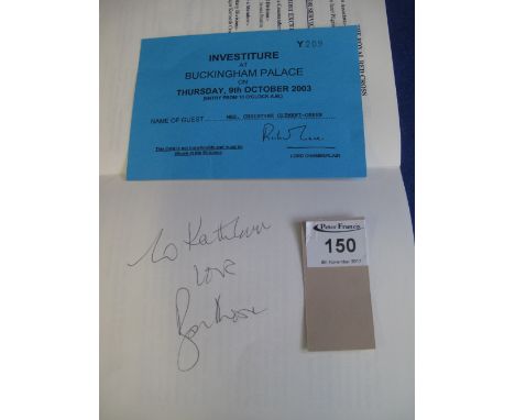 Sir Roger Moore, KBE (English actor 1927-2017), a Buckingham Pallace investiture programme from Thursday 9th October 2003. Si