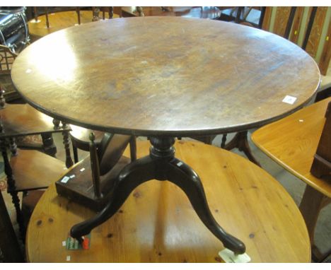 Large 19th Century mahogany tilt top tripod table on casters.(B.P. 24% incl. VAT)