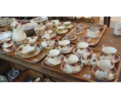 Two trays of Royal Albert 'Old Country Roses' bone china teaware items comprising: cups; saucers; teapot; milk jug; sucrier; 