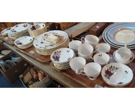Three trays of Colclough bone china 'Rose' design teaware items comprising: teacups and saucers; cake stand; bowls and plates