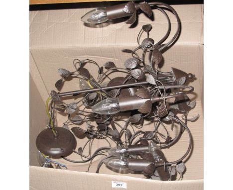 Modern metal ceiling light candelabra decorated with leaves.(B.P. 24% incl. VAT)