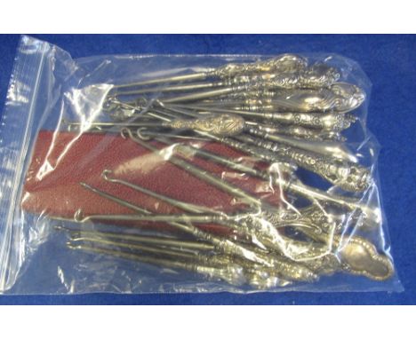 Bag of assorted silver handled boot hooks or button hooks, silver spoon etc. (B.P. 24% incl. VAT)