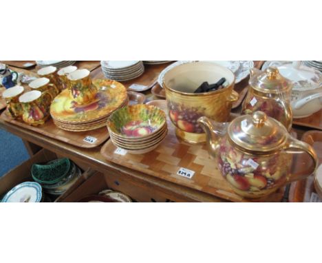 Two trays of modern Staffordshire fruit design items comprising: baluster teapot; jardiniere; bowls; jugs and plates. (2)(B.P