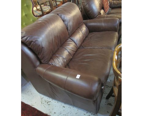 Good quality tan leather two seater sofa.(B.P. 24% incl. VAT)