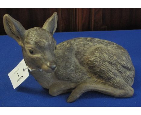 Poole Pottery study of a fawn by Linley Adams.  Matt finish.  Impressed and incised marks.  24cm long.(B.P. 24% incl. VAT)   