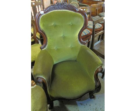 Victorian mahogany foliate carved, button back upholstered fireside armchair.(B.P. 24% incl. VAT)