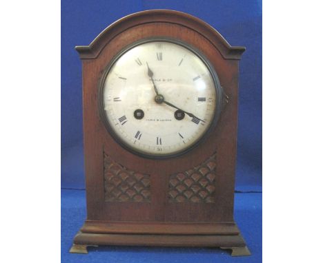 Early 20th Century mahogany two train bracket clock marked: Maple and Co., Paris and London, with brass handle and brass feet