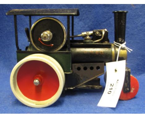 A German Marklin live steam tinned plate working model of a road roller, in original box with leaflet, oil bottles, funnel an