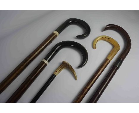 Five Shepherds Style Walking Sticks, To include Antler and Horn handled examples, Also one Stick having a Silver collar, 90cm