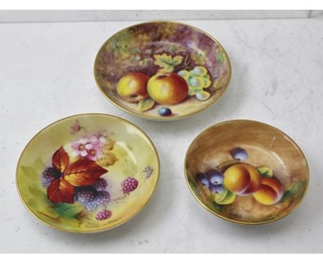 A ROYAL WORCESTER PORCELAIN PIN DISH, hand-painted autumn fruits design, signed 'K.Blake' (Kitty Blake), factory back stamp 1