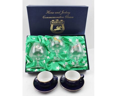 A CASED SET OF MARTELL COGNAC GRAND NATIONAL 2002 HORSE &amp; JOCKEY COMMEMORATIVE GLASSES, three brandy balloons each printe