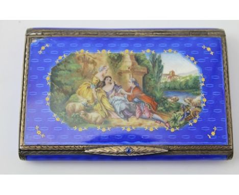 A CONTINENTAL SILVER GILT AND ENAMEL CACHOU BOX, blue guilloche enamel, the hinged cover decorated with an 18th century bucol