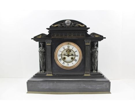 A LATE VICTORIAN BLACK SLATE MANTEL CLOCK of architectural form with caryatid decoration, the dial with outside Brocot escape