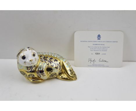 A ROYAL CROWN DERBY BONE CHINA IMARI PAPERWEIGHT, "Harbour Seal", limited edition no.1201 of 4500, in original box with certi