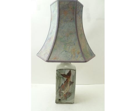 A COLIN KELLAM OF TOTNES STUDIO POTTERY TABLE LAMP, slab form stoneware glazed with fish decoration, 23cm high (with shade) 