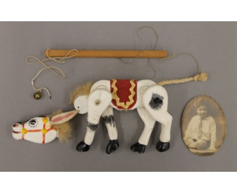 A vintage Muffin the Mule puppet. 19 cm long.