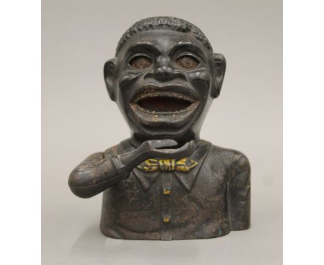 An original cast iron money bank, made by Shepard Hardware Co, Buffalo, NY, patented March 14 1882. 17.5 cm high. Notice from
