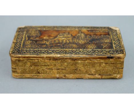 A 19th century snuff box (possibly wooden), the lid depicting Schloss Giech. 10.5 cm long.