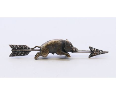A Russian diamond brooch formed as a boar astride an arrow.  7.5 cm long, 1 cm wide. 15.2 grammes.