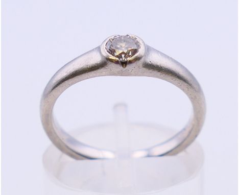 A platinum and diamond solitaire ring.  4.8 grammes.  Ring size K/L.
