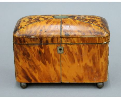 A 19th century tortoiseshell tea caddy. 19.5 cm wide.
