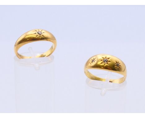 Two 18 ct gold diamond set rings.  Three stone ring size S, single stone ring size P. 7.9 grammes total weight.  