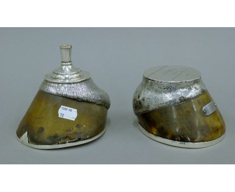 Two silver mounted-horses hooves, one a candlestick and the other a vesta/striker. The former 13.5 cm high.