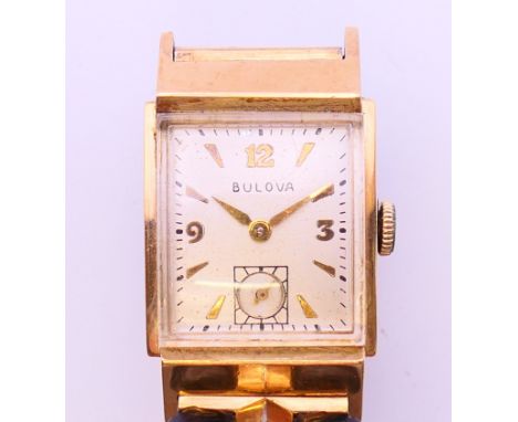 A Bulova wristwatch, the case marked 10 K gold filled and numbered 1255196.  Dial 2 cm x 1.75.