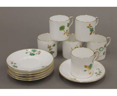 A Royal Worcester six-piece coffee set. The coffee cans each 6 cm high.