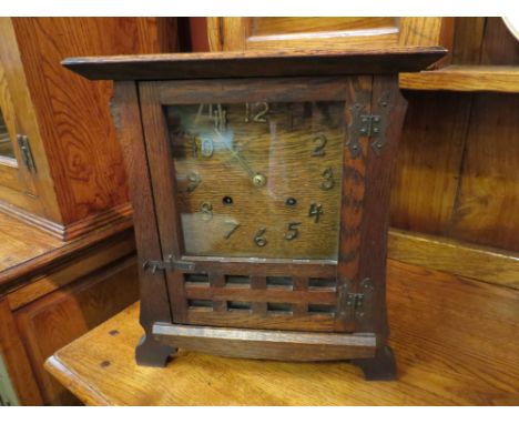 An American Arts &amp; Crafts oak mantel or shelf clock (possibly New Haven Clock Co), in the style of William E Sessions. Wi