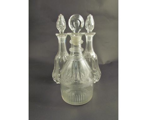 A pair of crystal glass decanters and a Georgian ring neck decanter