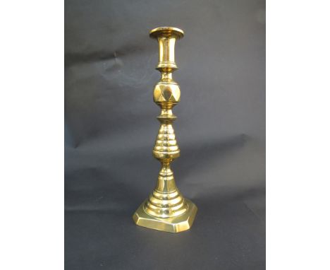A Victorian faceted brass candlestick, 30cm tall
