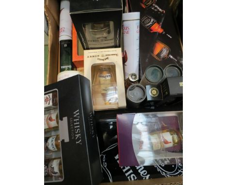 A box containing a variety of presentation and Christmas Scotch whisky and Jack Daniels bottles in boxes, etc