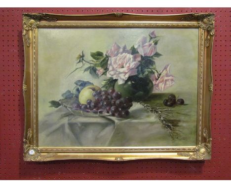 An oil on canvas of still-life flowers and grapes on textiles, gilt framed, 44cm x 59cm