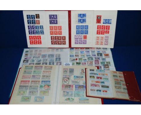 Four Stamp Stock Books: one with Commonwealth stamps from countries including Zanzibar, Sudan and a blue "sitting Britannia" 